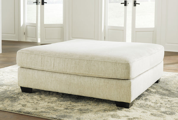  this firmly cushioned square ottoman is covered in a decadently soft chenille microfiber thatâ€™s love at first touch