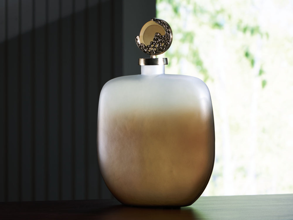 Bring stately elegance home with this jar. Made with frosted glass in a luxurious taupe finish, its ombre effect adds visual intrigue to a shelf or mantle. A textured goldtone topper provides an added dose of traditional flair.<br/><br/><b>Product Feature