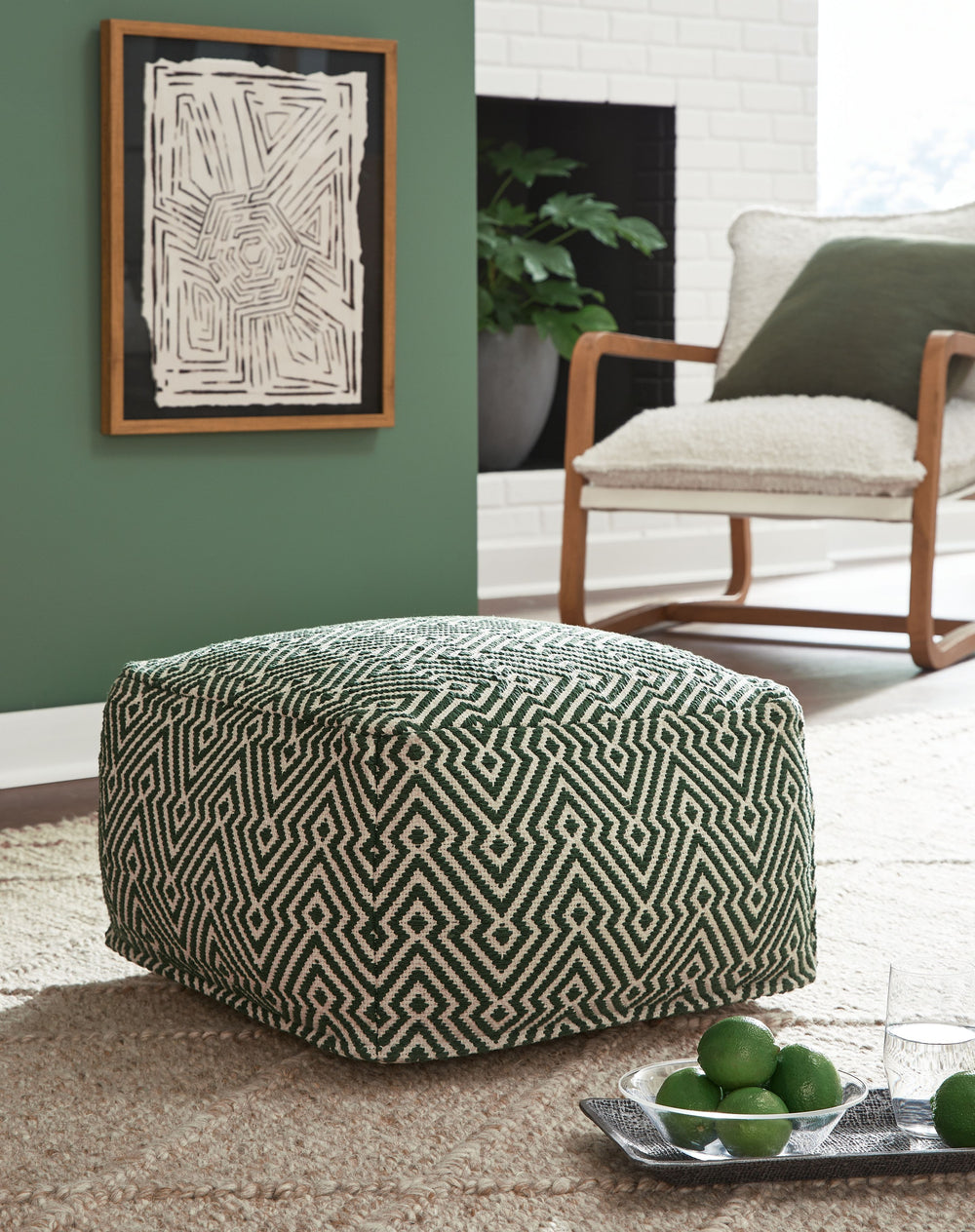 Itâ€™s hard to say what we love best about this pouf. Is it the soft feel of the handwoven cotton cover? The on-trend geometric pattern? Or perhaps itâ€™s the goes-with-anything color scheme? Any way you look at it, this pouf has a lot to love.<br/><br/><