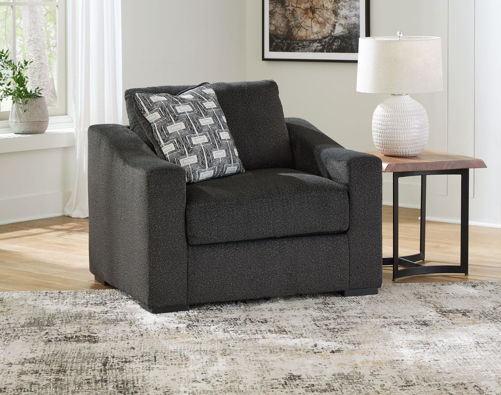 Your downtime should be super-cozyâ€”and super-chic. This oversized chair encourages stylish indulgence as you lounge. Plush, chunky upholstery adds a relaxed yet eclectic twist to the transitional look. With this exquisitely comfortable and fashion-forwa