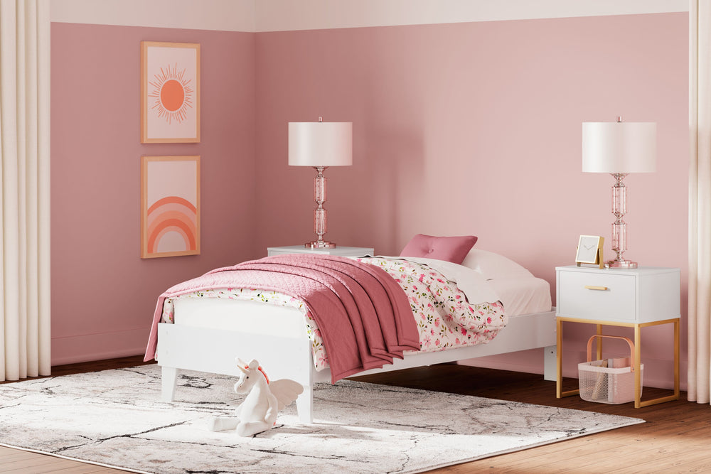 Bringing big style to small living areas, this twin platform bed is a smart, space-saving choice for those with an eye for contemporary design. Its clean-lined profile and understated refinements create a simple silhouette that works in so many settings.<