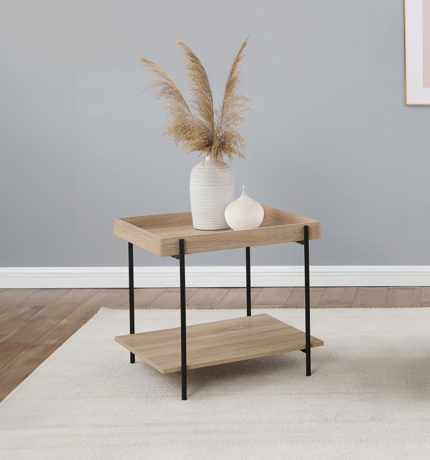 Infuse your space with the contemporary casual vibes of a modern end table, constructed from metal and engineered wood. This charming choice offers a tray-like table top that creates a sense of depth and dimension, perfect for refreshments or a decorative