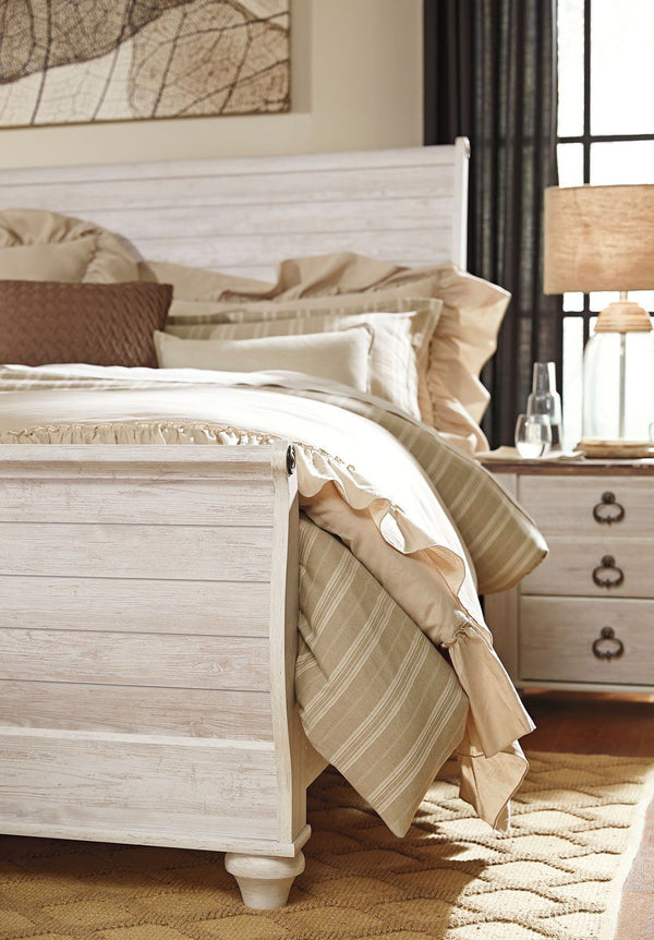  this king sleigh bed carries you away to a dreamy time and place. Driftwoody whitewashed finish is wonderfully easy on the eyes. Faux plank detailing incorporates a classically rustic 