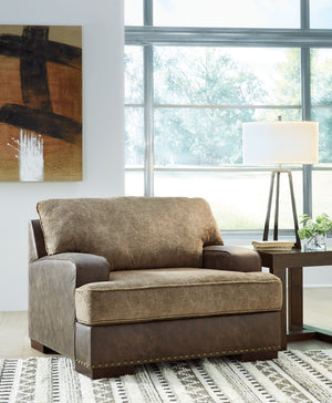  this chair and ottoman are perfect for those who love the look of leather. Two textural tones provide twice the style and comfortâ€”and incorporate an added layer of visual interest. The piece is punctuated by a subtle band