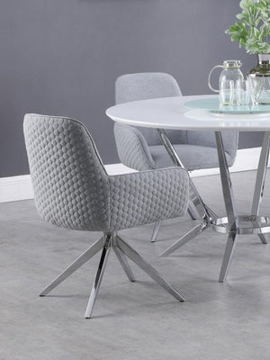  this swivel dining armchair offers both style and function. Upholstered in light grey fabric