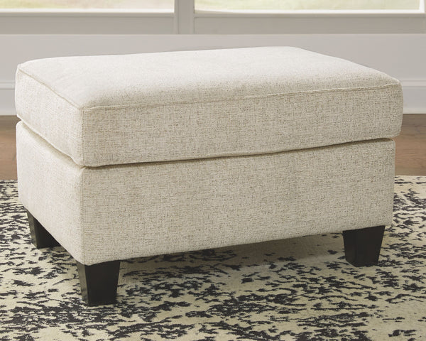  youâ€™re sure to find this ottoman a breath of fresh air. Covered in a cream-tone chenille upholstery loaded with plush texture