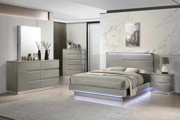 The Paradox Bedroom Collection is a stunning fusion of contemporary design and luxurious functionality. Its Gray gloss laminate water-resistant finish adds a sleek and modern touch while ensuring durability. The full extension drawer glides allow for effo