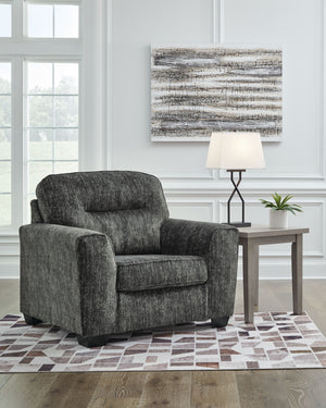  the plush upholstery and dark tri-block legs are a natural complement for so many color schemes. Curling up with a good boo