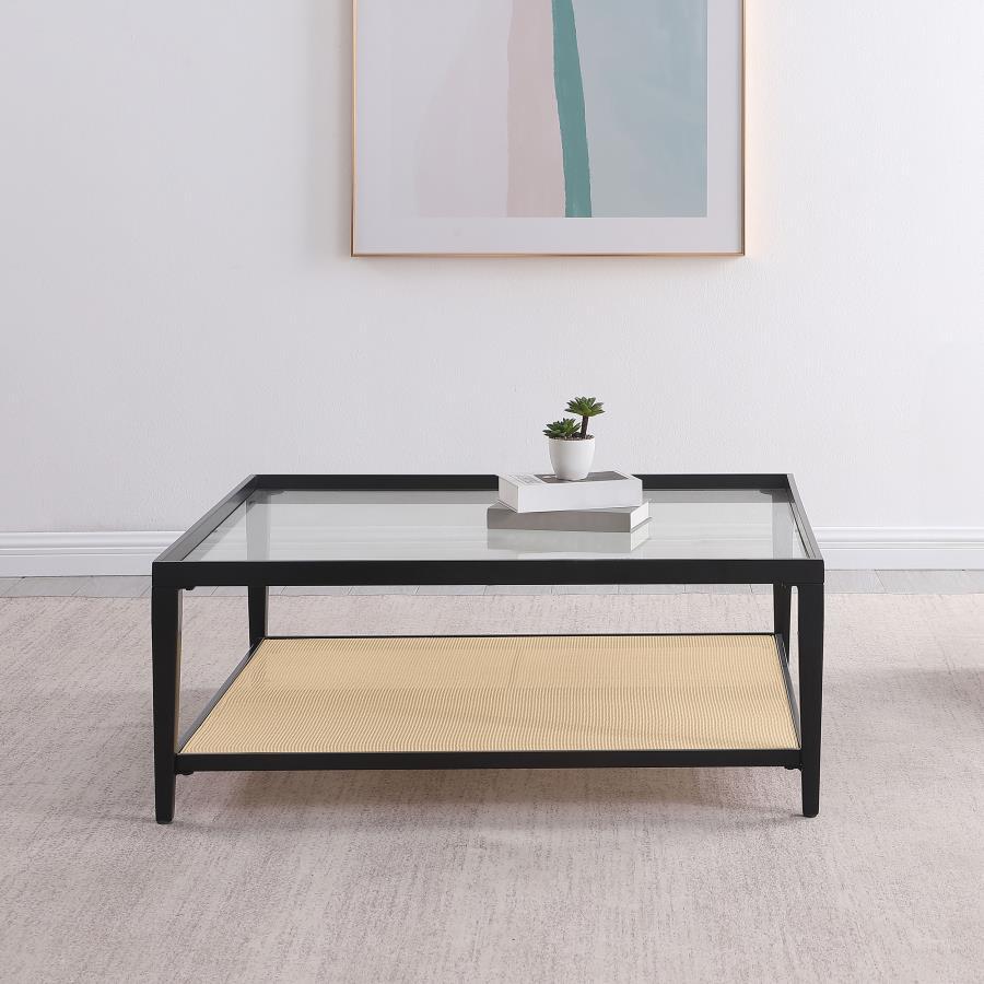 Enhance your living room with the contemporary charm of this sleek square coffee table. The black powder-coated metal frame creates a clean, modern aesthetic, while the recessed clear tempered glass top provides an elegant and spacious surface for your de