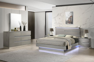 The Paradox 5 Piece Platform Bedroom Set in Gray is the epitome of modern elegance and functional design. This set includes a platform bed along with a dresser, mirror, and 2 nightstands. The gleaming Gray gloss laminate finish offers a sleek, contemporar