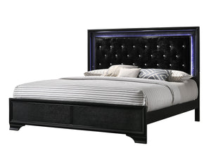 Step into a realm of sophistication and comfort with this stunning bedroom collection. Each piece showcases an exquisite blend of traditional charm and contemporary flair, making a bold statement with its textured surfaces and rich black finish. The bed, 