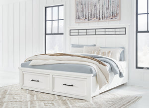  classic white finish and black pulls exude a comfortably cozy vibe in