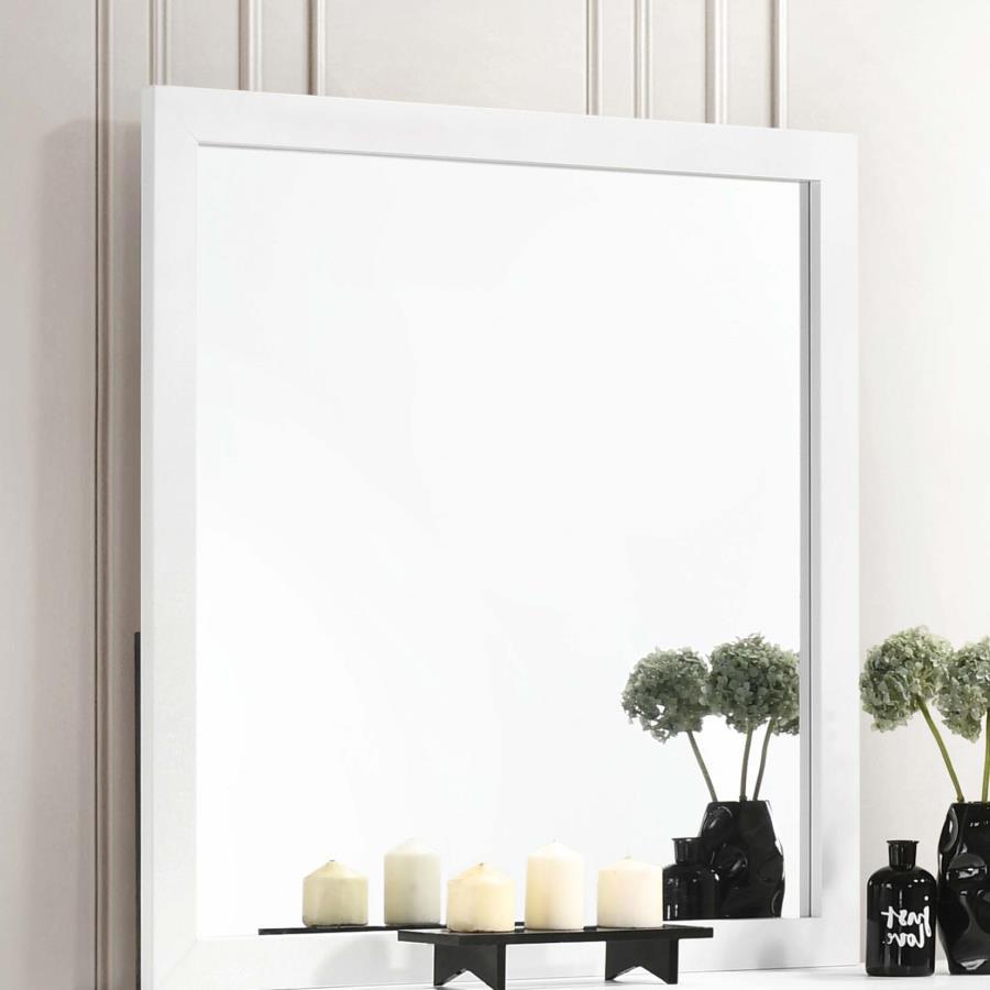Dress up your bedroom with this elegantly understated contemporary mirror. Framed in a rectangular shape, this mirror rests on top of a dresser and offers height to focal walls. The flush and smooth frame presents a simple minimalist surface, elevated by 