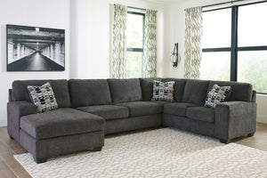 A mastery in less is more, this sectional manages to make cool, contemporary design so warm and cozy. A new twist on neutral, the sectionalâ€™s soothing -"smoky-" gray upholstery is incredibly plush to the touch. Gently rounded corners give the clean-line
