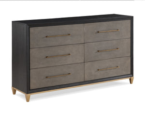  a bed with an upholstered headboard