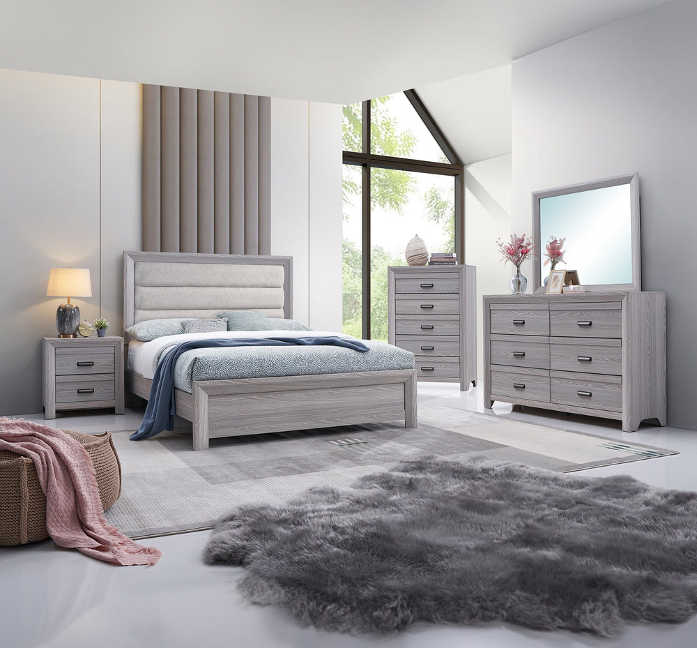 This bedroom set is the embodiment of understated sophistication, featuring a neutral drift wood finish that complements its clean and contemporary design. The robust bed frame anchors the room with a plush channel tufted headboard. Accompanying the bed a
