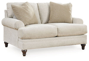 Seeking simple, transitional style? Enter this loveseat. Its commitment to carefree comfort is right at home with your relaxed living room aesthetic. A subtle chevron effect elevates the everyday charm of the neutral fabric, while the deep, plush seats br