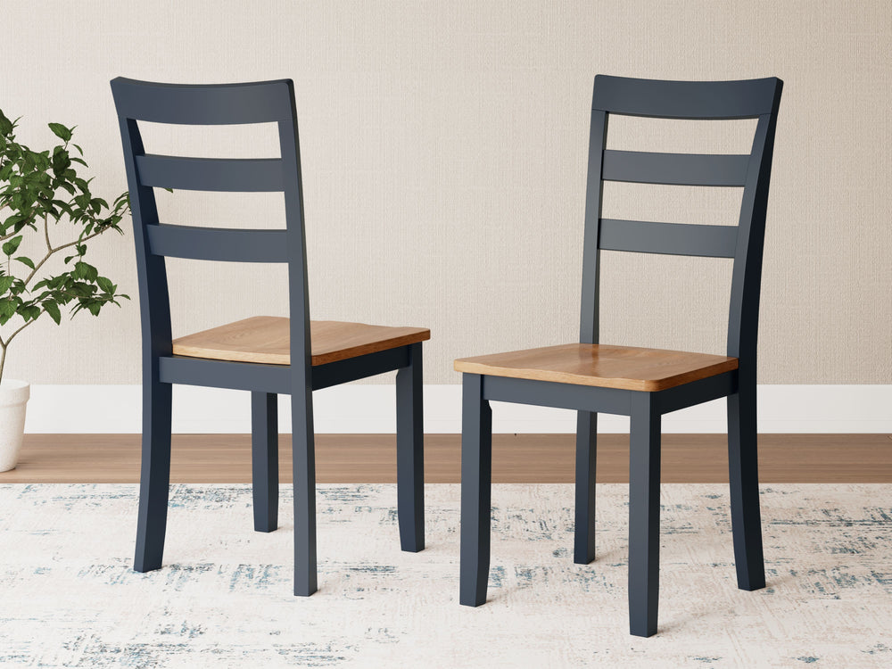 Complement your homeâ€™s simply relaxed sensibility with this dining chair. A dark blue hue offers a chic contrast to the natural wood tone, for a casual look that vibes with a variety of aesthetics. Its hard, contoured seat design prioritizes both cleana