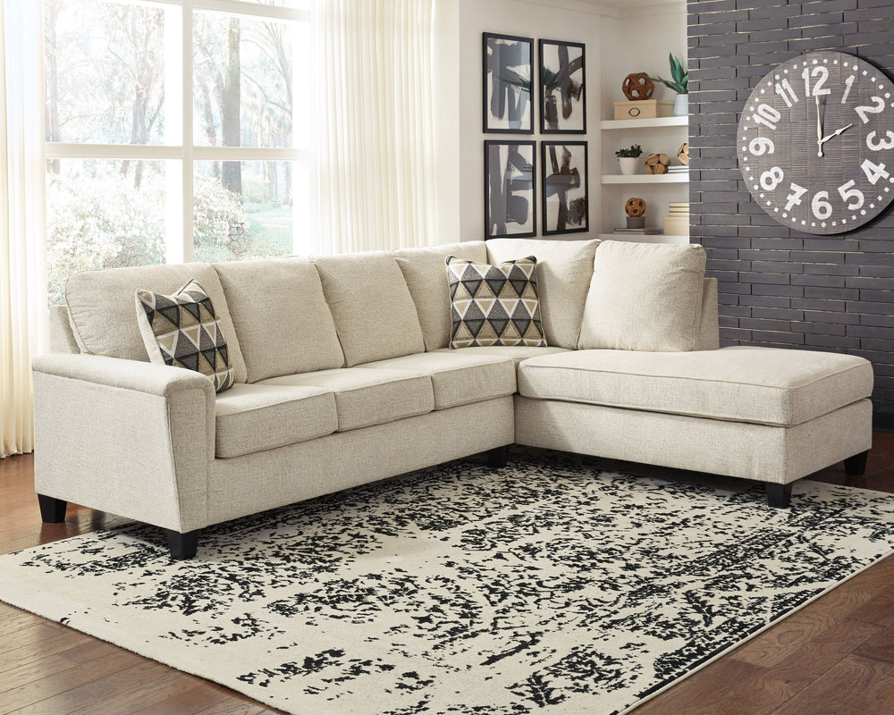 If youâ€™re looking to lighten the mood, youâ€™re sure to find this budget-conscious sectional sleeper beautifully fits the bill. Covered in a creme chenille upholstery loaded with plush texture, this less-is-more contemporary sectional is dressed to impr