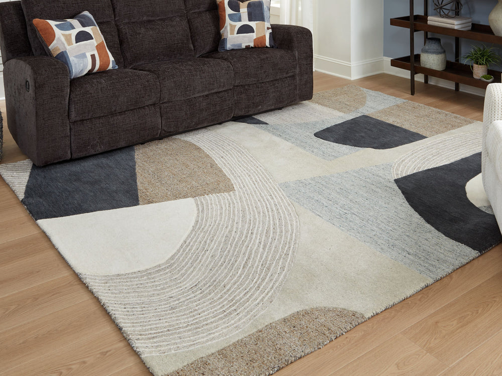 Take a casual approach to mod aesthetics with this rug. Neutral shades come together in a dynamic abstract pattern, with the high-low construction incorporating eye-catching dimension. Adding a soft feel underfoot, this rug is such a chic combination of s