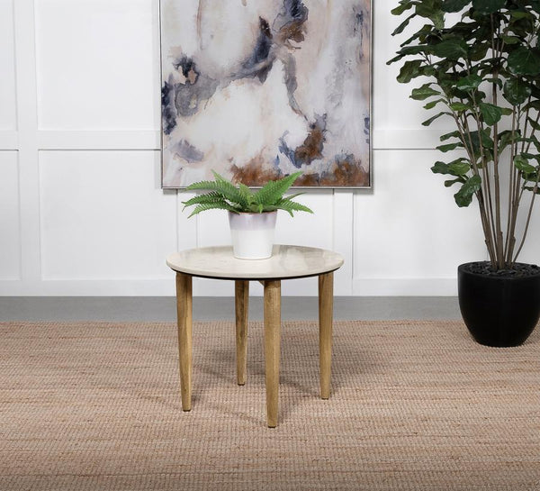  natural style offers a fresh look to a casual living space as this end table adds low-key yet elegant personality. A rustic feel and warm motif follow this round table crafted in India. Organic materials deliver an earthy aspect to easy-living furni