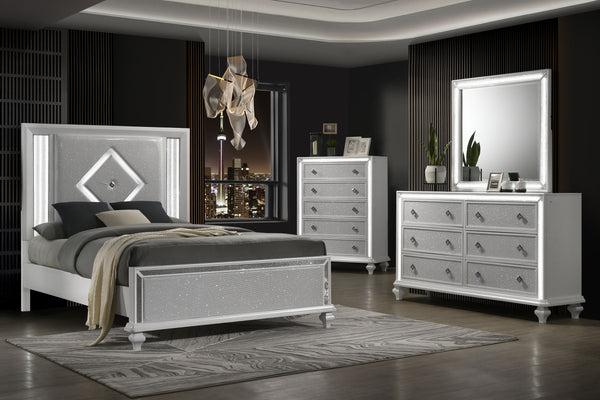 Indulge in the opulent allure of the Stardust 4 Piece Bedroom Set in White, a pinnacle of modern luxury for your bedroom ensemble. The set, which includes a Bed, Dresser, Mirror and Chest, is crafted with meticulous attention to detail, each piece boasts 