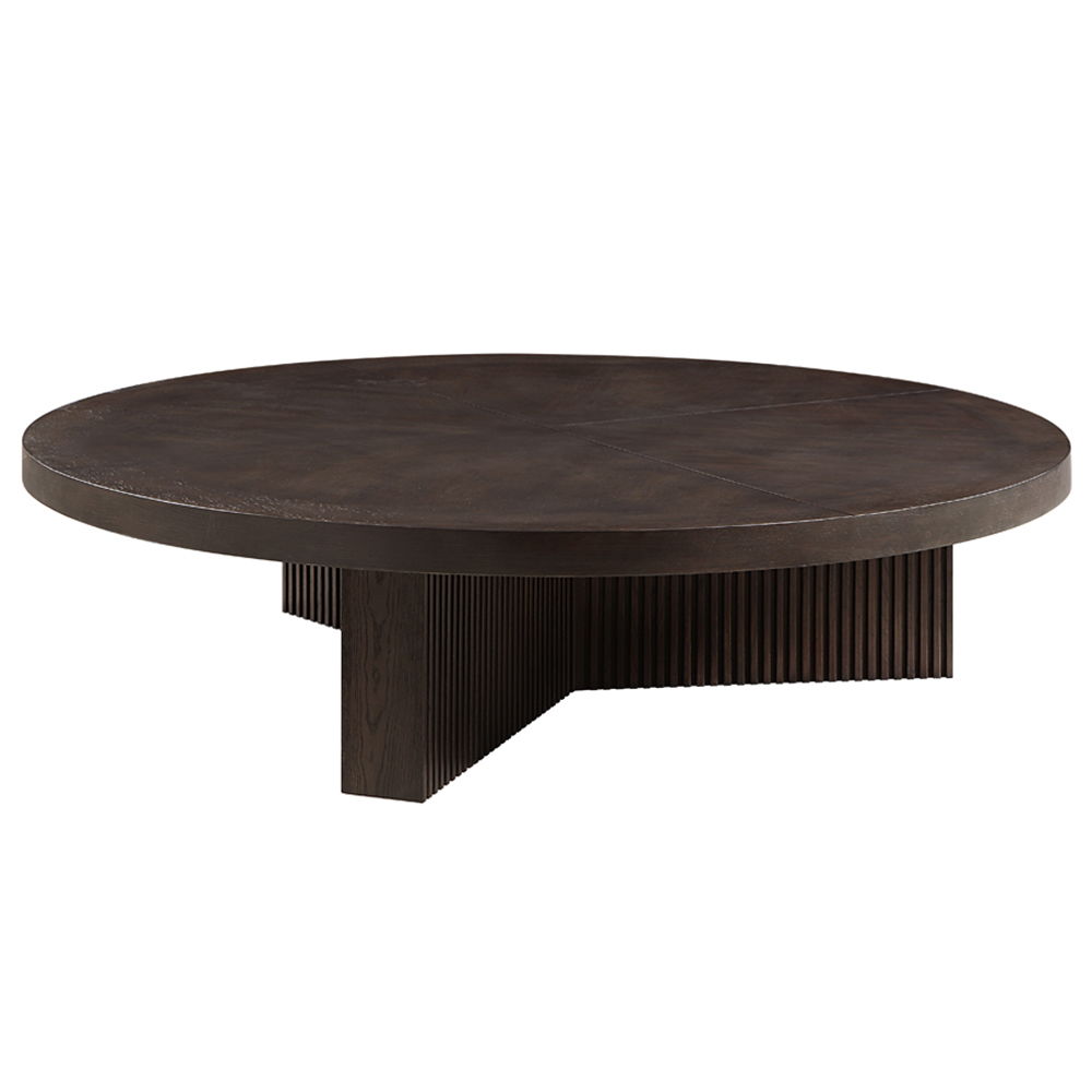 The Guido coffee table with its oak finish, exudes a blend of contemporary elegance and robust functionality. Featuring a fixed wooden table top and a round, oversized design, it is perfect for modern living spaces. The table-'s substantial presence and s