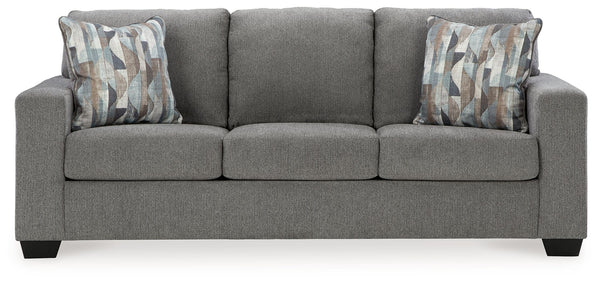 Youâ€™re in for a neat treat with this sofa. Its comfy seats are covered in soft, textural upholstery, and the wide track arms are eager to support your quest for total relaxation. Distressed abstract toss pillows bring a fresh breath of contemporary styl