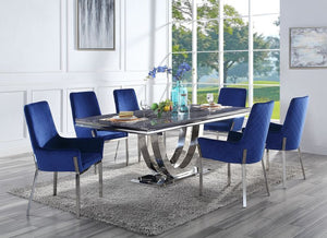 Update your dining space with the Cambrie dining collection. The table features an eye-catching metal geometric pedestal base that is sure to leave your dinner guests impressed. The ample faux marble tabletop adds more visual interest to the piece. The ma