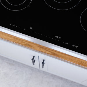 Benchmark®, Electric Cooktop, 30'', Black, surface mount with frame