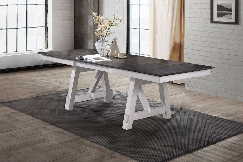The Maisie Wood Two-Tone Dining Table offers a perfect blend of quality craftsmanship and welcoming rustic charm, ideal for any dining space. This table, crafted from solid rubberwood, manufactured woods, and Mindy wood veneers, is designed for durability