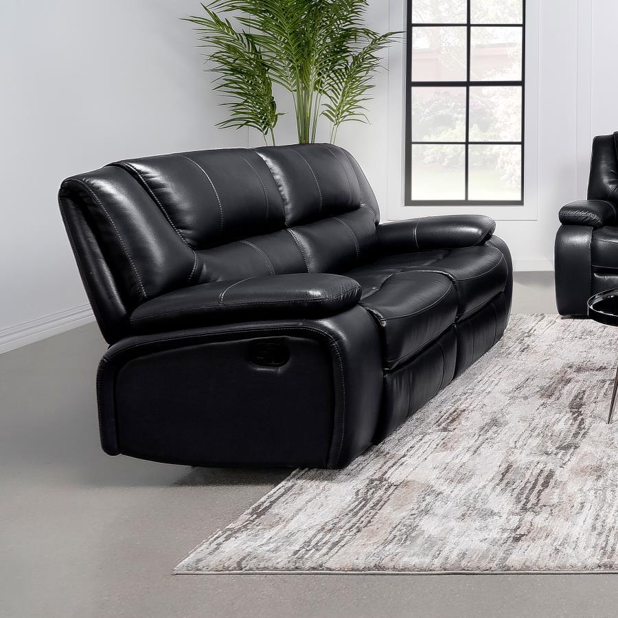 Bold black leatherette upholstery offers the look of luxurious leather with easy-care maintenance as the motion loveseat is versatile and beautiful. Living rooms, family rooms, and media venues become comfort zones with the plump feel and clean design of 