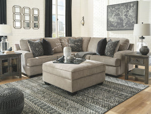  this sectional in a stone-tone neutral upholstery has the corner on style. Merging ultimate comfort with striking good looks