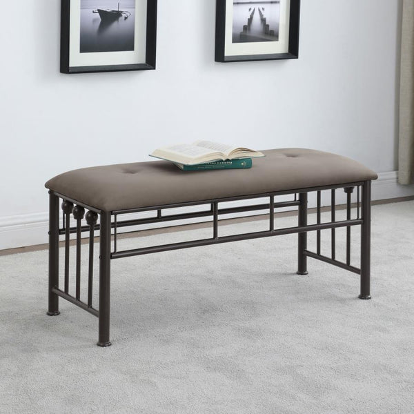  it includes a softly cushioned seat upholstered in brown microfiber for added comfort. Vertical rods and ball accents echo
