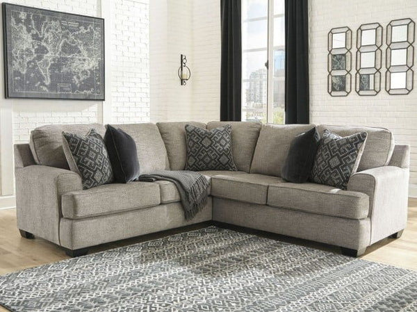 Whether your vision is clean and contemporary or cozy modern farmhouse, this sectional in a stone-tone neutral upholstery has the corner on style. Merging ultimate comfort with striking good looks, this chic sectional includes five coordinating accent pil