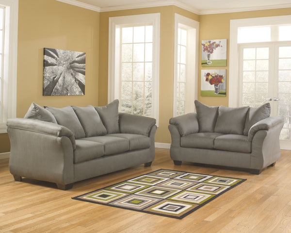 Everyone can have the best seat in the house with this sofa and loveseat. An indulgent choice with deep seats crafted for cloud-like softness, this set is the ideal merger of modern flair and classic staying power. <h4><b>Darcy - Cobblestone - Sofa</b></h