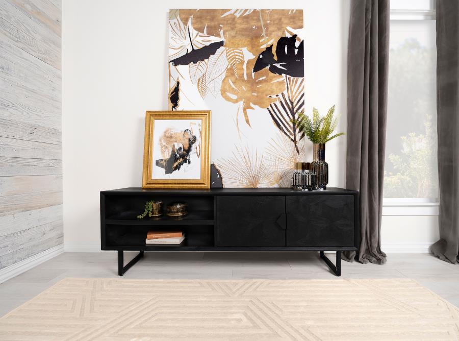 A dramatic charcoal black finish coats wood products construction, adding a bold look to this casual yet elegant TV stand. Gather entertainment-related gear and organize it in this tasteful stand built of mango wood with a rustic aesthetic. Set atop black