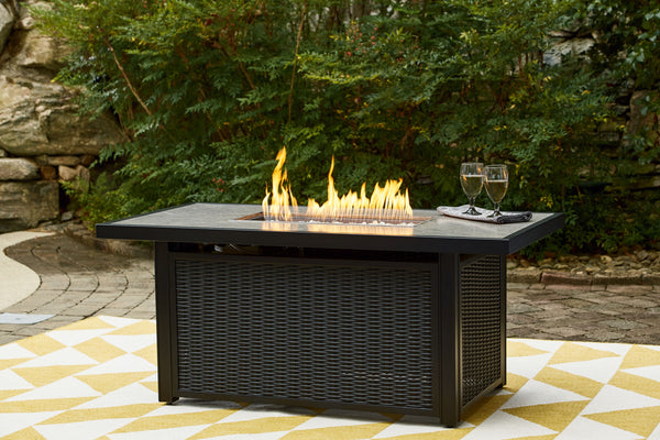  this fire pit table elevates the art of alfresco living. Its handpainted top is paired with all-weather resin wicker over rust-proof aluminum for beauty and brawn. A stainless steel burner with glass beads adds a cap