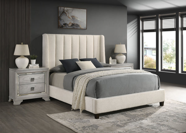 Add stylish comfort to your bedroom with this lush bed. Fully upholstered in on trend boucle upholstery, the design is enhanced with a winged and channel tufted headboard.<h4><b>Agnes - Queen Headboard And Footboard - White</b></h4> <table width="100%"><c