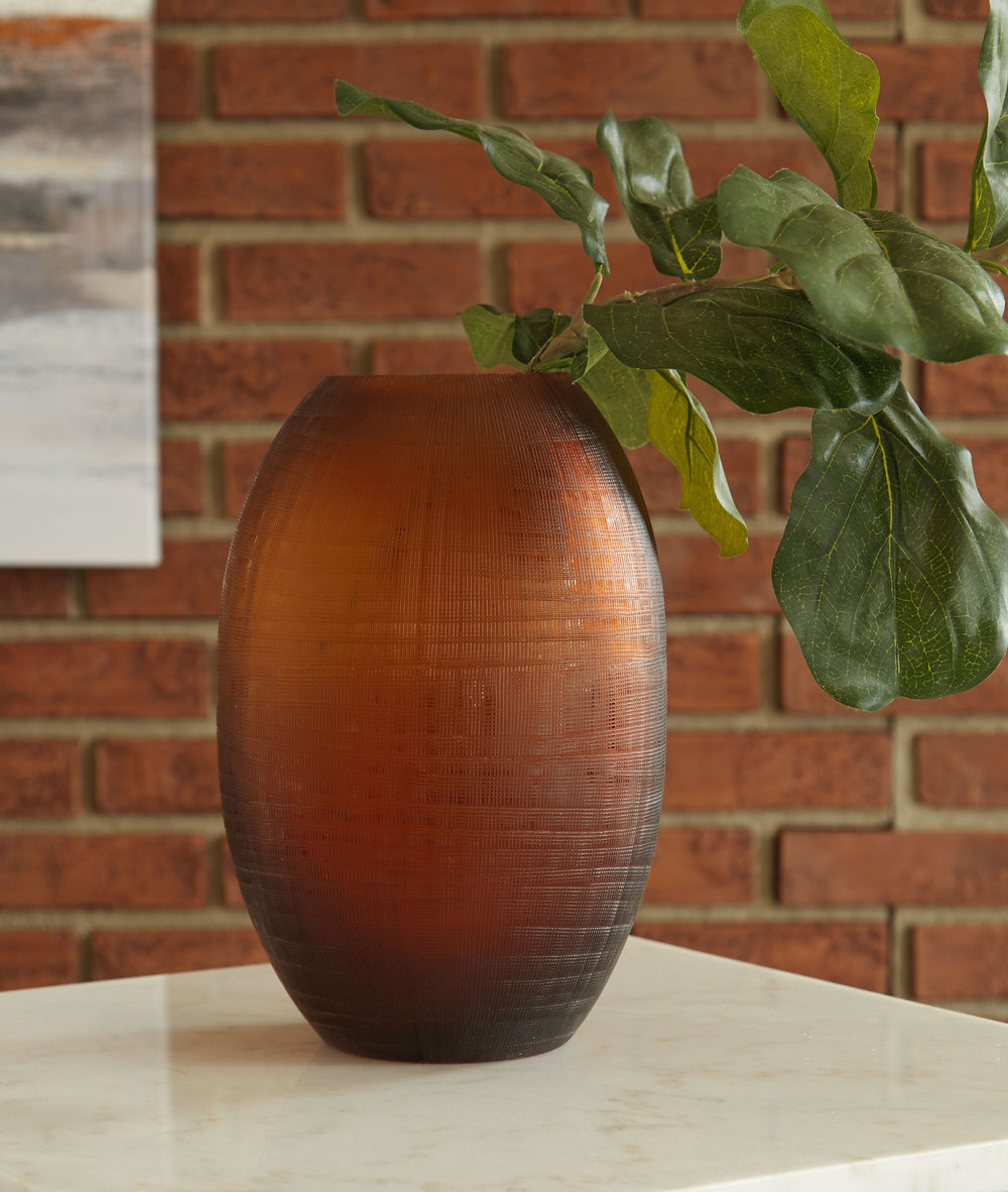 Beautiful on its own or in a group, this vase is sure to make a statement. It-'s ideal for displaying flowers and greenery, with a sturdy, minimalist design that accommodates wet or dry arrangements.<br><br><b>Additional Dimensions</b><br><ul><li>Opening: