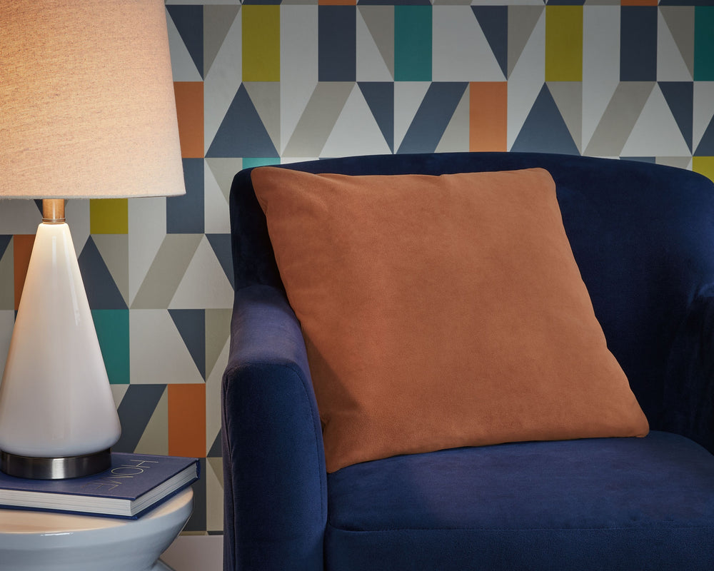This pillow is made for lovers of luxe style and velvety comfort. Decadently soft in a shade of spice, itâ€™s an unassuming way to dress up your contemporary decor. Pair this pillow with pieces from the same palette, or use it to add a hint of color to a 