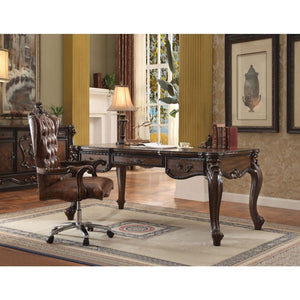 The Versailles office set was inspired by old European design. This collection features carved scrollwork accent with antique hand-brushed finish. The accent pieces crafted in wood with cherry oak finish and also included regal features such as ample stor