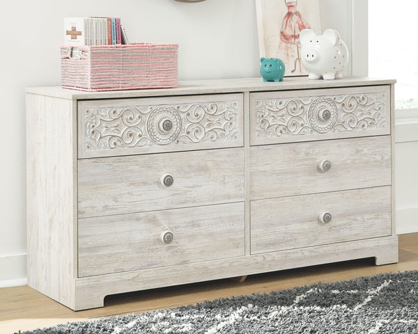  this whitewashed dresser invites you to go to town. Its distinctive weatherworn finish conveys an easy-breezy sensibility