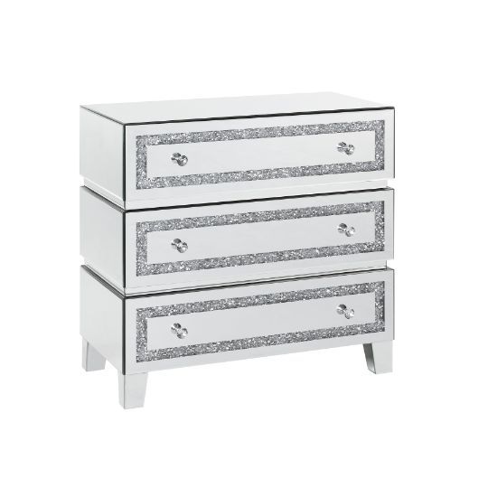 The Noor Cabinet will add a contemporary touch to any room in your home. With its clean lines and faux diamond inlay, this brilliant cabinet showcases a distinctive style for an intriguing look. The cabinet features two doors and two storage drawers with 