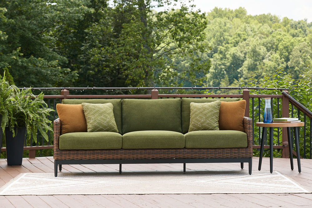 This outdoor sofa recalls the aesthetics of nature to bring an inviting, high-style feel to your patio or lanai. Its Nuvella+â„¢ performance fabric is made with enhanced UV resistance, so the chic green hue stays brighter for longer. Worried about the wea