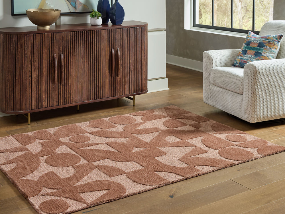 This exquisitely hand-tufted rug invites you to indulge in marvelously modern style. Its warm, earthy palette and geometric design give you a beautiful room that looks and feels finished. That makes us smileâ€”how about you?<br/><br/><b>Product Features</