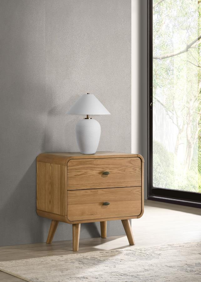 Enhance bedside functionality with this mid-century modern nightstand, crafted from pine, engineered wood, and walnut veneer for lasting durability. Featuring rounded edges, tapered legs, and a sleek silhouette, it adds a touch of retro sophistication to 
