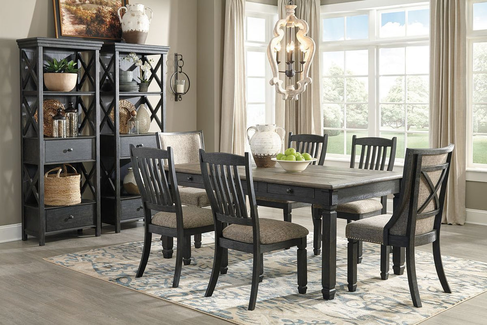 Unique two-tone finish with a combination of Oak and Acacia substrates combining a trendy textured antique black color with table and server tops finished in a textural weathered oak finish. Rectangular dining table features six convenient drawers for sto