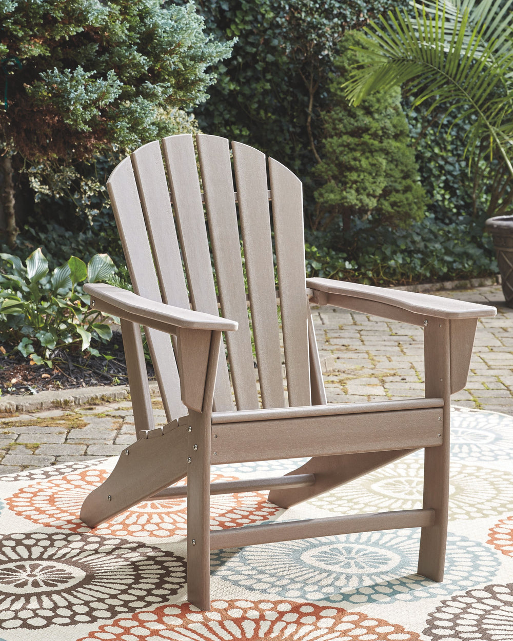 Ashley Express. Made with virgin high density poly-ethylene material. All with textured grain driftwood finish. P014-827 includes cup holder feature. <h4><b>Sundown Treasure - Driftwood - Adirondack Chair</b></h4> <table width=-"100%-"><colgroup><col styl