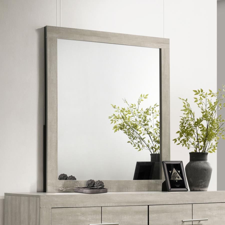 This contemporary mirror adds a refined touch to any bedroom with its clean, minimalist frame and rustic cream finish. Crafted with a rough-sawn, white-washed engineered paper veneer, it complements the dresser with its understated elegance. The mirror no